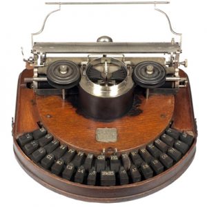 Photograph of the Hammond 1 typewriter with mahogany finish, small file.