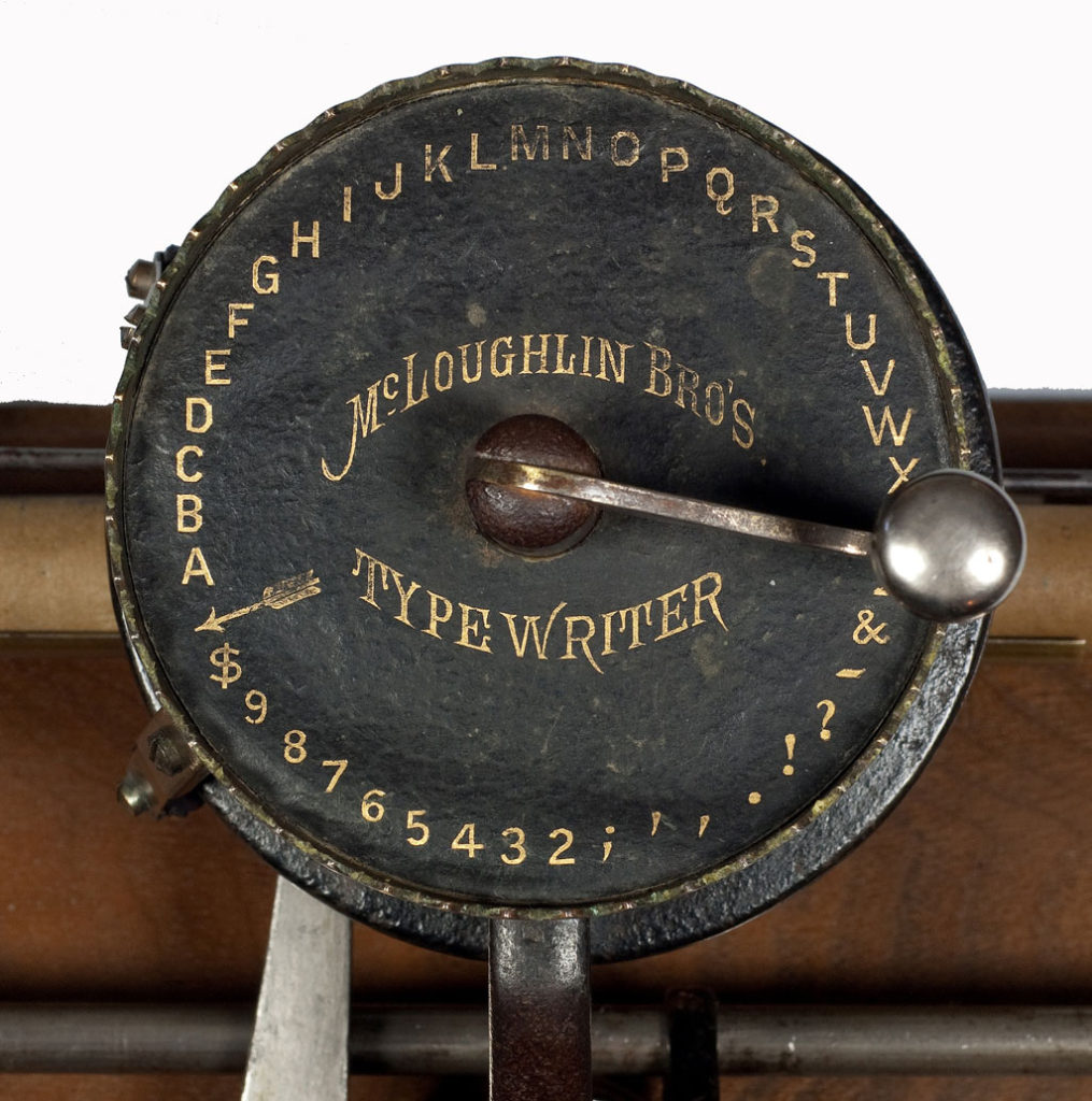 Close up of the McLoughlin Brothers typewriter character index.