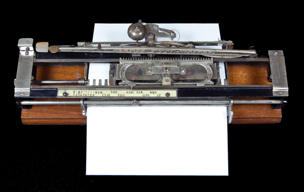 Picture of the Alexis typewriter with paper in it.