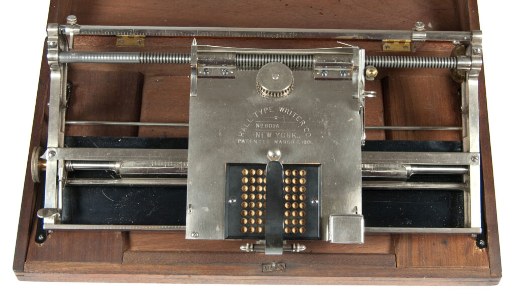 Full top view of the Hall 1 typewriter.