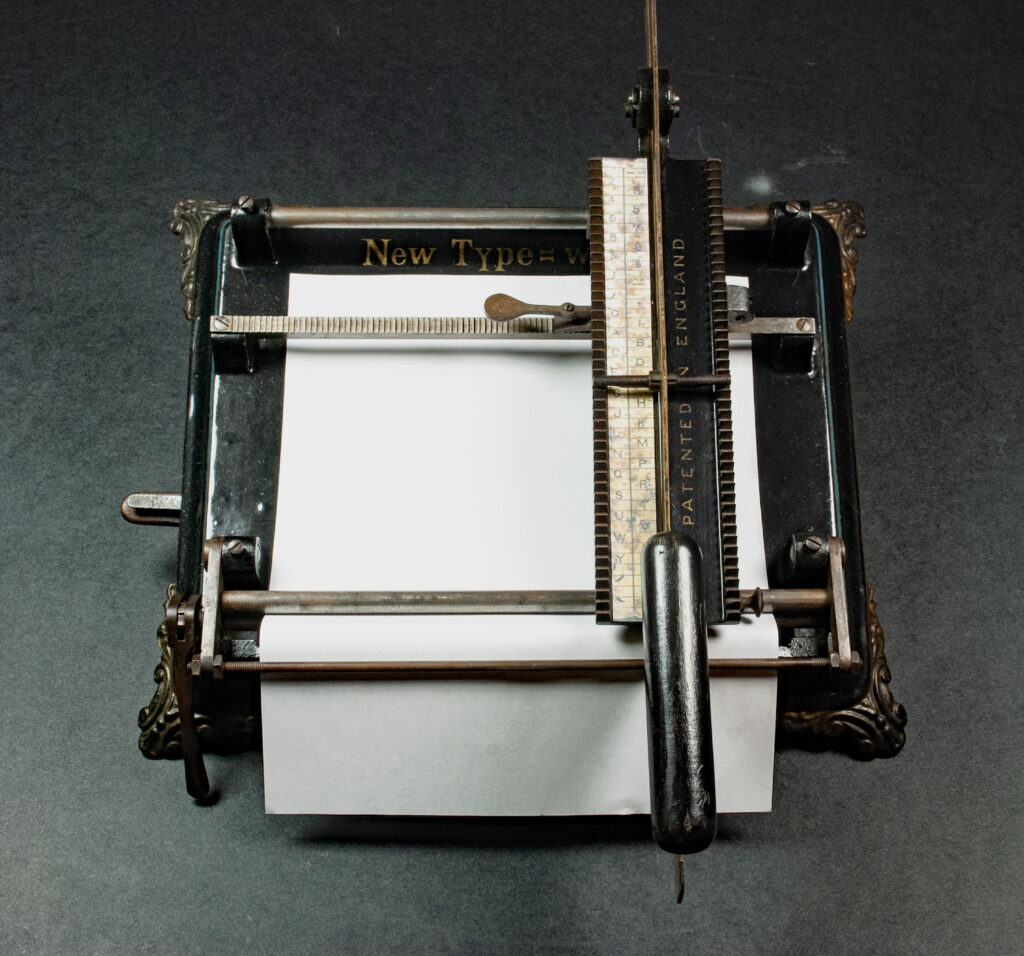 Hammonia typewriter with paper loaded in.