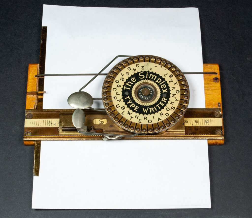 Simplex typewriter with paper loaded in.