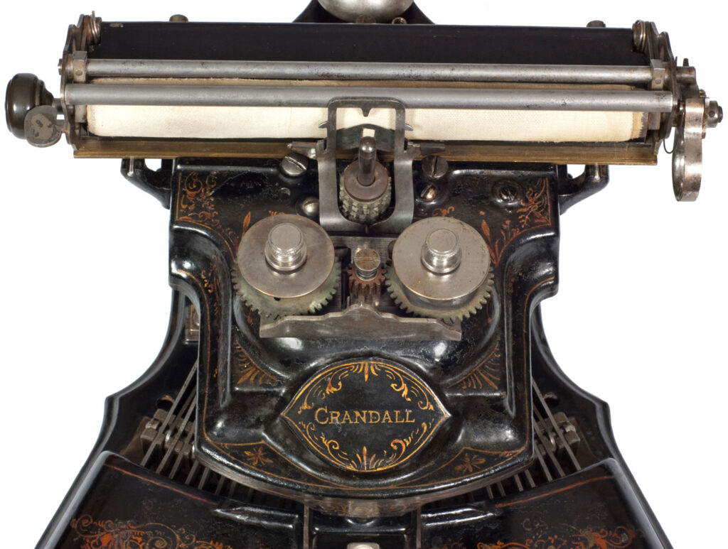 Close up of the Crandall 1 typewriter carriage.
