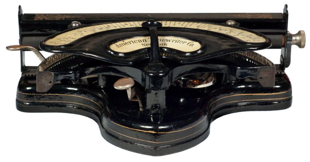Photograph of the American 1 typewriter seen low from the front.
