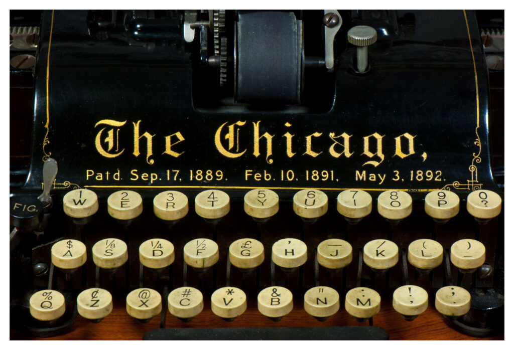 Photograph of the Chicago 1 typewriter showing the top cover.