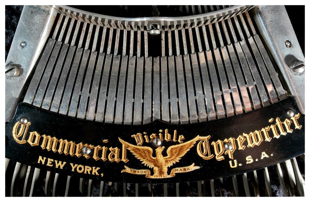 Close up view of the top decal on the Commercial Visible 6 typewriter.