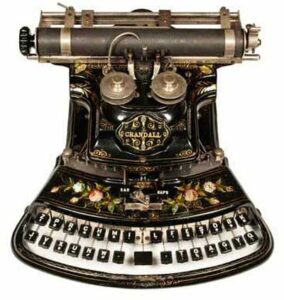 Photo of the Crandall New Model typewriter.