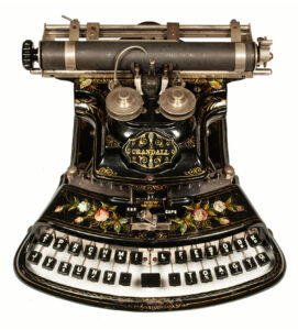 Photo of the Crandall New Model typewriter.