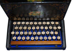 A photograph of the QWERTY keyboard on the Sholes and Glidden typewriter.