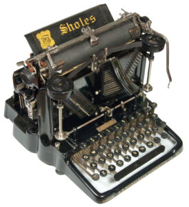 Photograph of the Sholes Visible typewriter.
