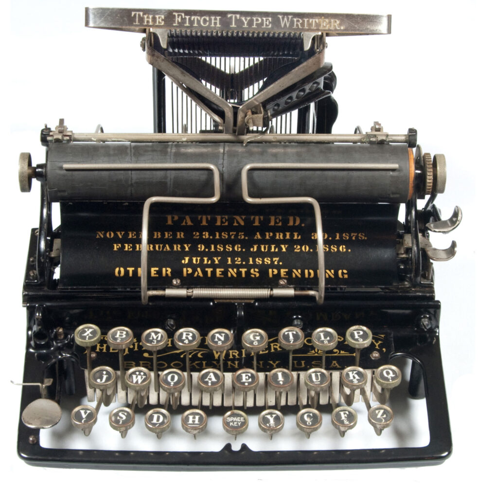 Low front view of the Fitch 1 typewriter.