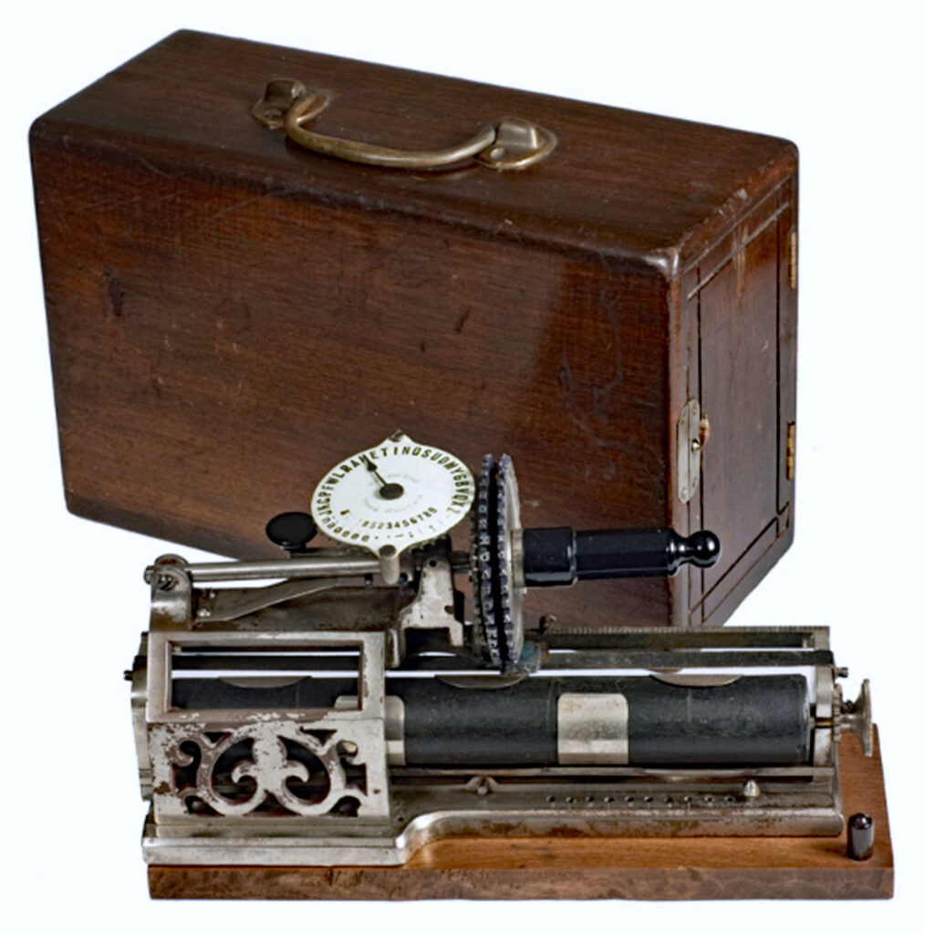 Columbia 1 typewriter shown with its wooden case.