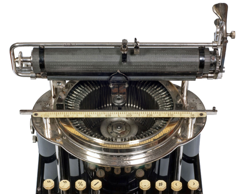 Top view of the Yost 1 typewriter with the carriage raised