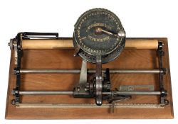 Photograph of the McLoughlin Brothers typewriter.